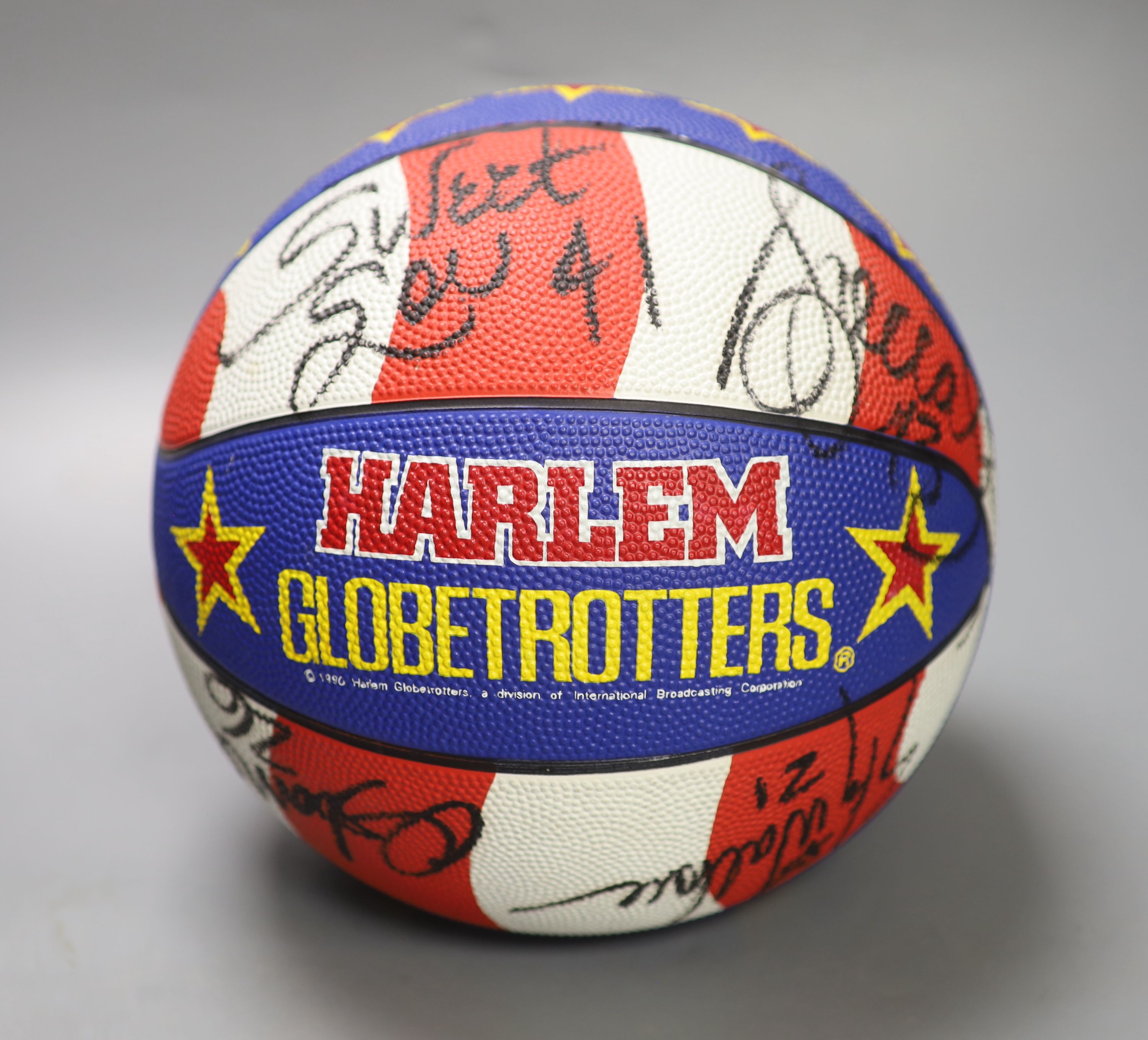 A Harlem Globe Trotters signed basketball